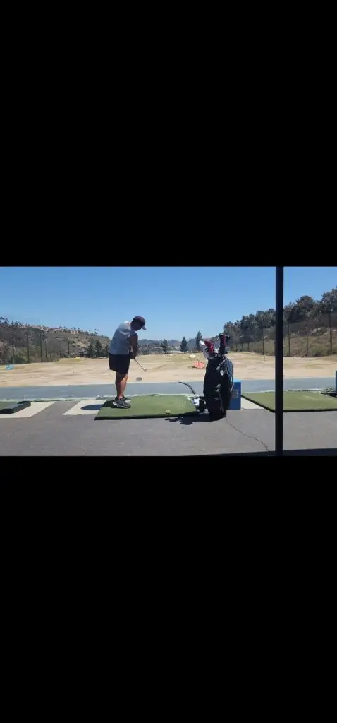 Driving range workout for golfers over 50 — practice session warm-up on the driving range